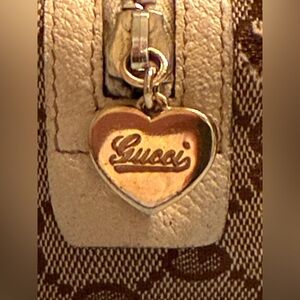 Gucci Beige and Brown Monogram
Cosmetic Bag